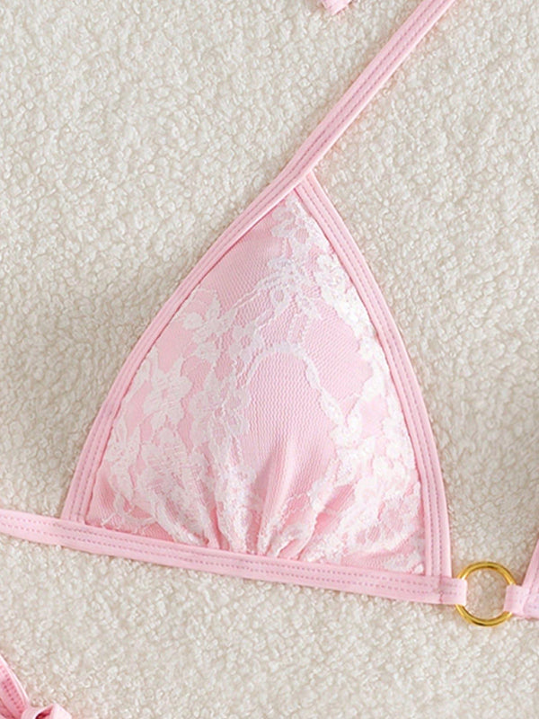 Pink lace bikini top from the Backless White Lace and Pink Bikini, includes size chart