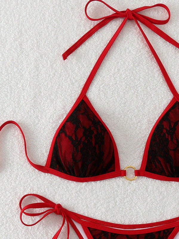 Red and black lace backless bikini displayed in a product titled Black Lace and Red Backless Bikini