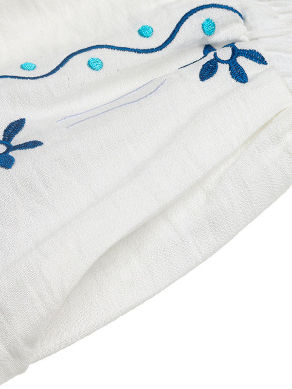 White fabric with blue embroidery displayed on Casual Embroidered Cardigan Set Sleeveless Vest Shorts Two-piece Set