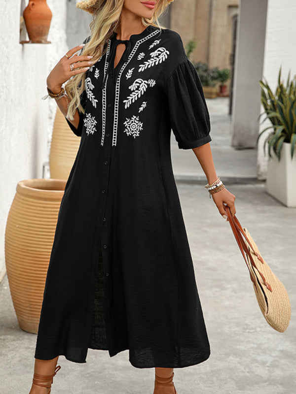 Black embroidered midi dress with ethnic style and loose five-point sleeves displayed