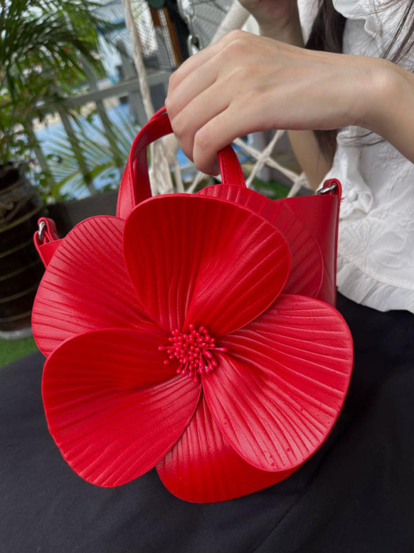 Red flower-adorned handbag, a versatile piece for stylish shoulder or crossbody wear