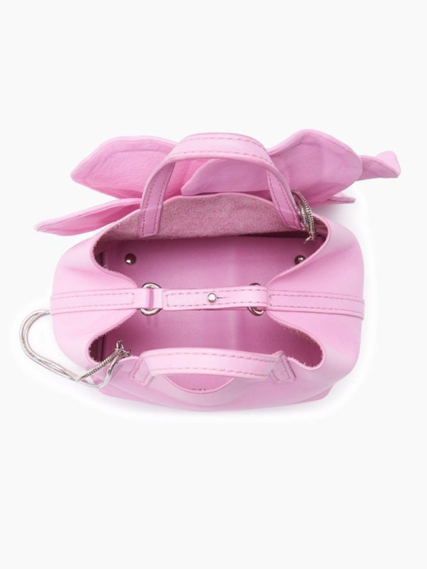 Pink leather handbag with bow, a versatile piece from Creative Flower Handbag Collection