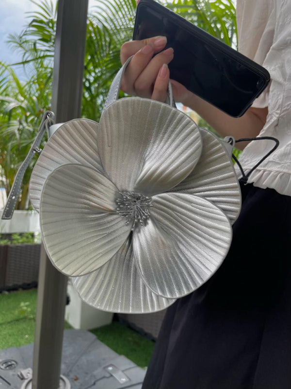 Silver flower-shaped handbag, a versatile piece from the Creative Flower Handbag collection