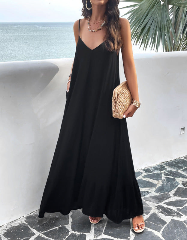 Elegant solid color loose suspender dress featuring black spaghetti straps