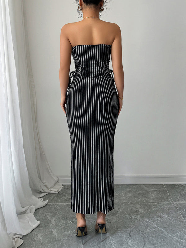 Elegant striped strapless maxi dress showcased in the Elegant Striped Strappy Tube Top Hip Skirt Suit