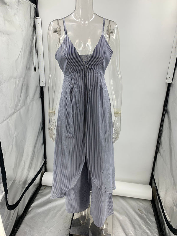 Fashionable sleeveless striped camisole top paired with matching striped trousers two-piece set