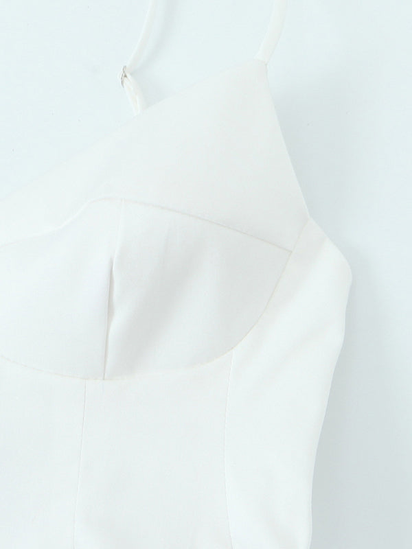 White strappy dress showcased in a fashionable spaghetti strap top for elegant style