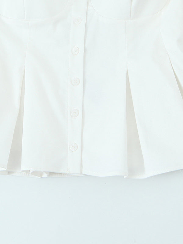White pleated shirt displayed as part of a fashionable spaghetti strap top for women