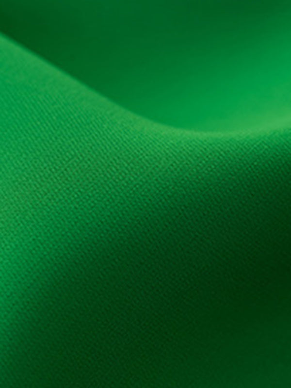 Green fabric with subtle texture for feminine solid color sleeveless shirt top