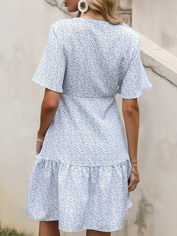 Floral print mini dress with short sleeves and V neckline, slim fit style