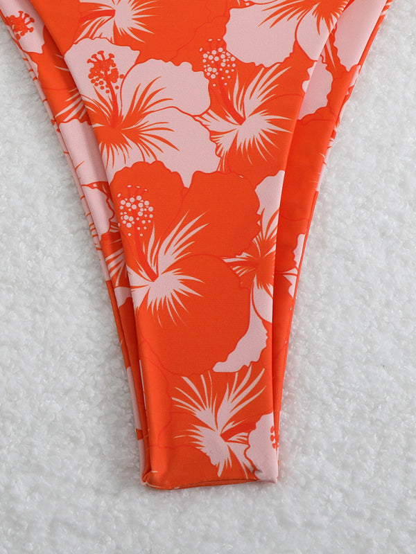 Orange floral print bikini bottom displayed in the Floral Print Halterneck Bikini product