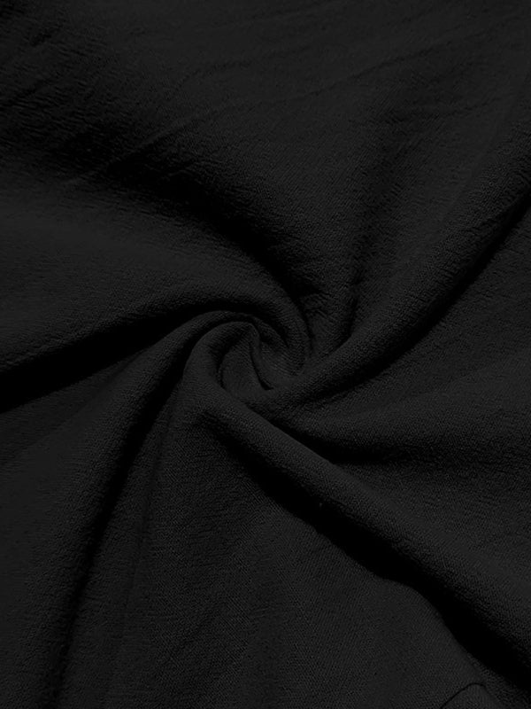 Black textured fabric with a swirl pattern on men’s breathable linen casual trousers