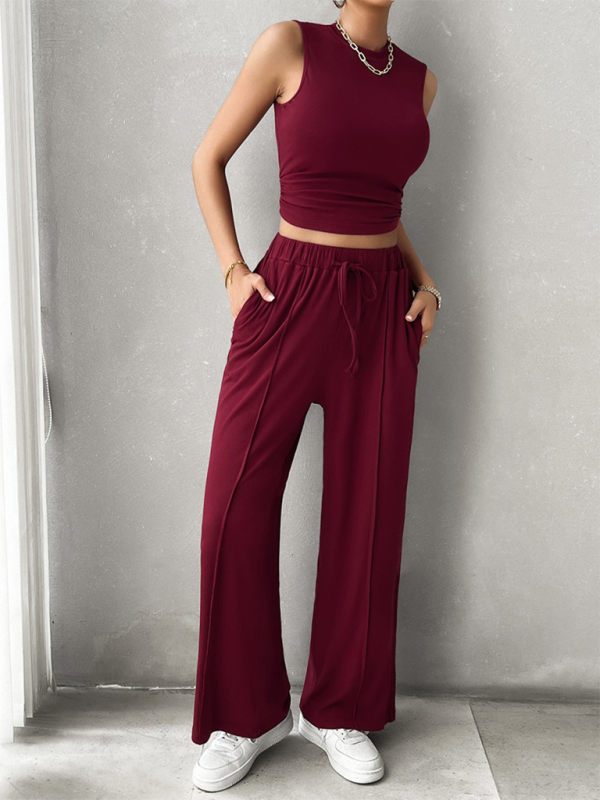 Burgundy two-piece outfit featuring casual round neck sleeveless top and trousers with comfortable fit