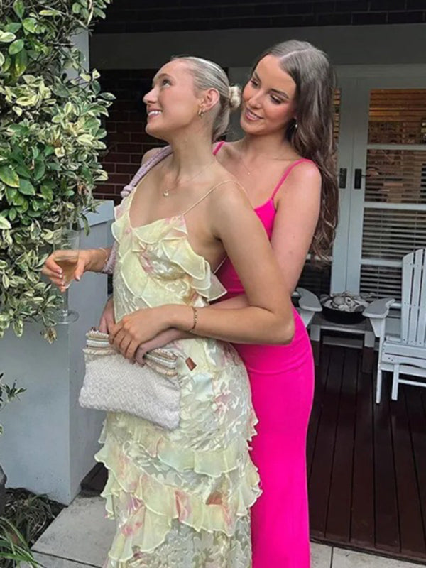 Two women in formal dresses wearing the New Holiday Wavy Edge Suspender Dress