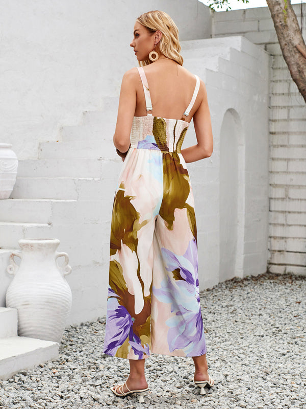 Floral print jumpsuit with printed shoulder strap and sizing guide for all sizes