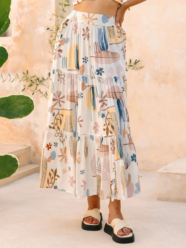 Tiered patterned maxi skirt in polyester fabric from New White Plant Print Bohemian Holiday Beach Skirt collection