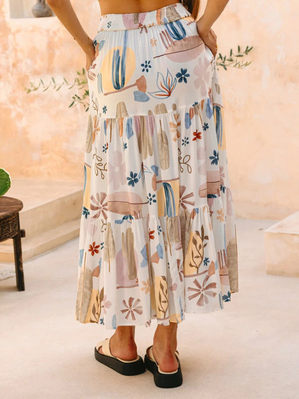 Tiered patterned maxi skirt made from polyester fabric in the New White Plant Print Bohemian Holiday Beach Skirt collection