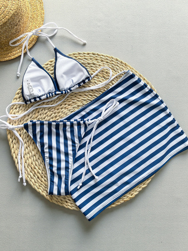Striped bikini and skirt set displayed in a women’s three-piece swimsuit product image