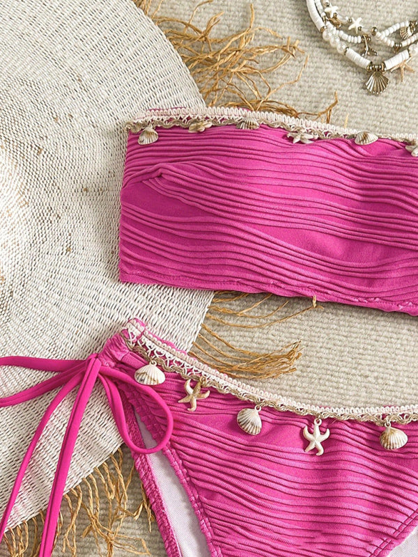 Pink textured bikini with seashell and starfish charms showcases high elasticity in the Sexy Starfish Shell Tassel Swimsuit Bikini