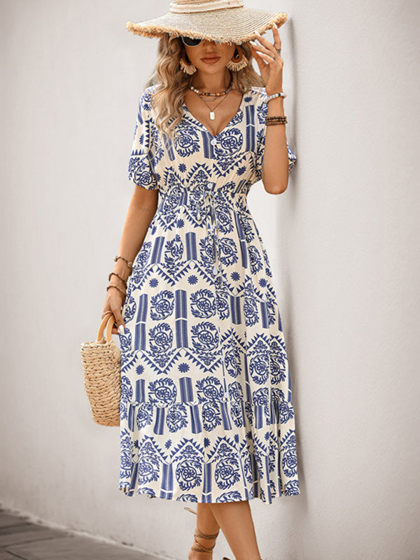 Woman wearing a simple casual A-line ethnic style dress with rayon fabric and body print