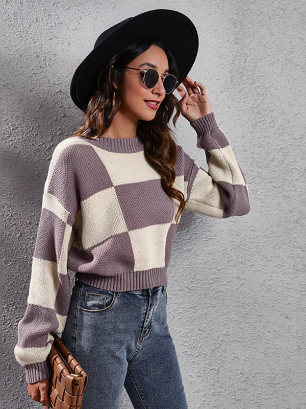 Women’s checkerboard knit sweater with dropped shoulder sleeves and short acrylic sleeves