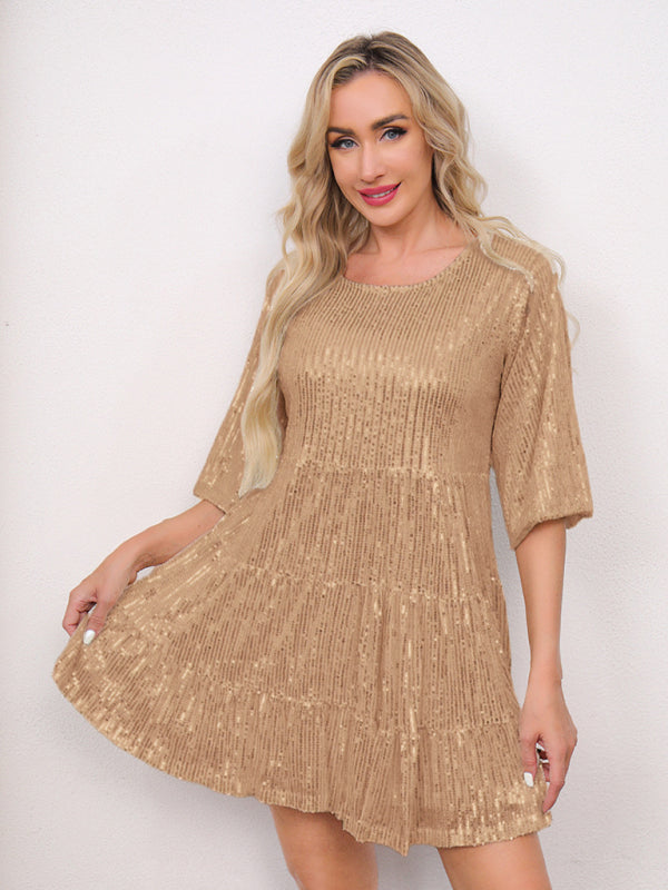 Gold pleated short dress with loose waist, short sleeves, and sequined detailing
