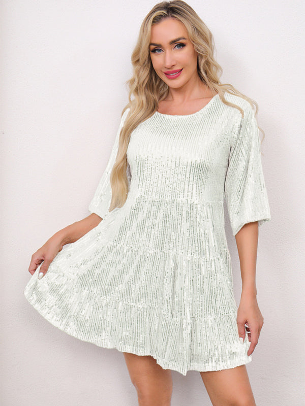 Woman in a white tiered short-sleeved dress from Women’s Fashion Sequined Party Dress collection
