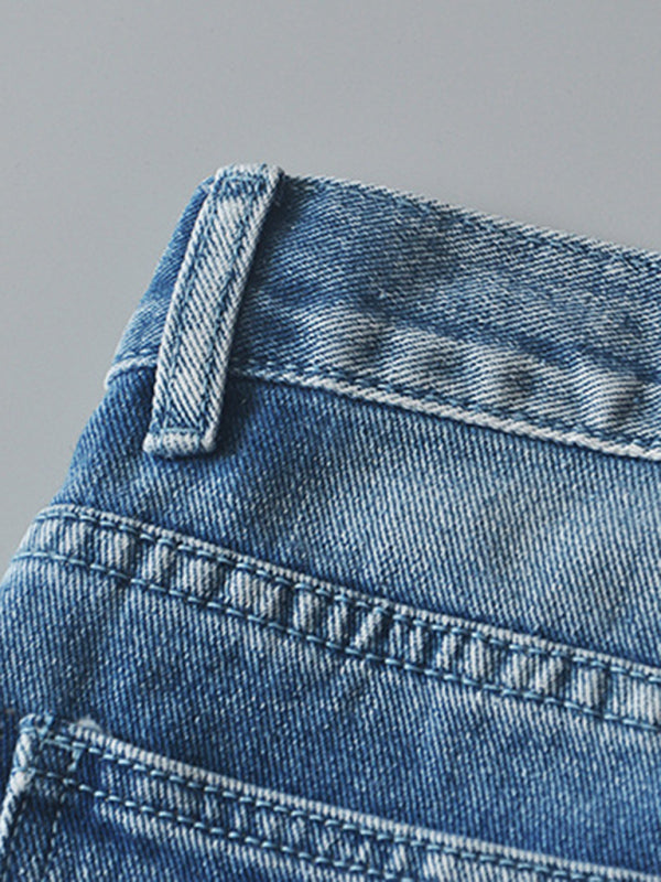 Women’s high-waisted buttoned-up washed ripped raw edge denim shorts hot pants
