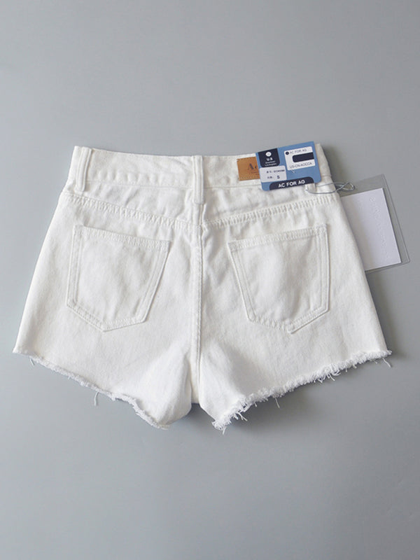 Women’s high-waisted buttoned-up washed ripped raw edge denim shorts hot pants