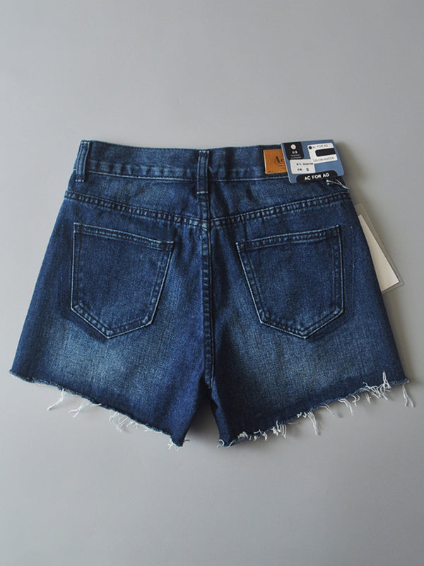 Women’s high-waisted buttoned-up washed ripped raw edge denim shorts hot pants