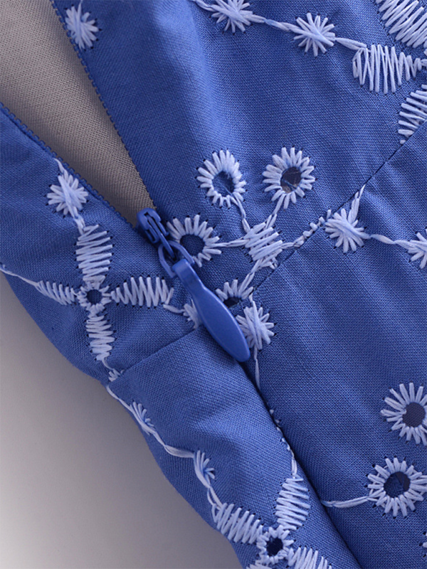 Blue fabric with white floral embroidery and zipper on Women’s Hollow Embroidery Slim Suspender Dress