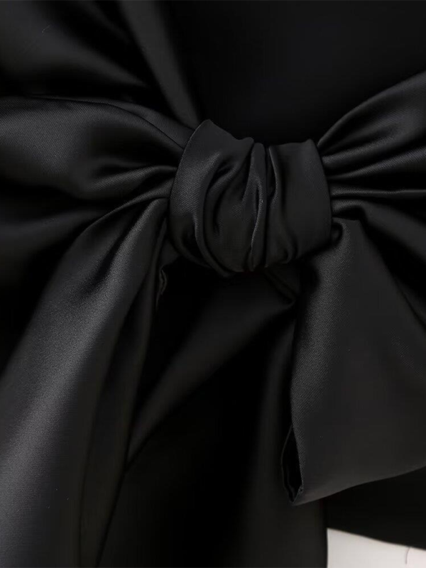 Women’s satin camisole top with bow on the back