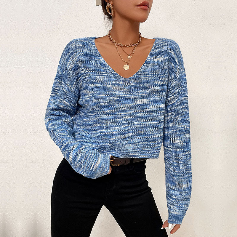 Blue and white knit women’s long sleeve V-neck sweater with dropped shoulder sleeves