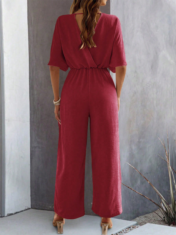 Maroon short-sleeved wide-leg jumpsuit showcasing a stylish and casual design for women