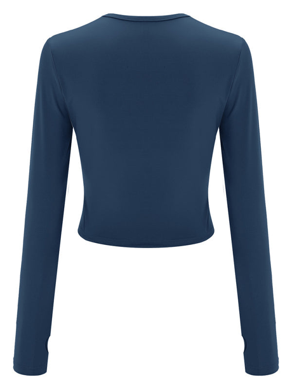 Blue long-sleeved crop top showcasing solid color bottoming design for women’s fashion