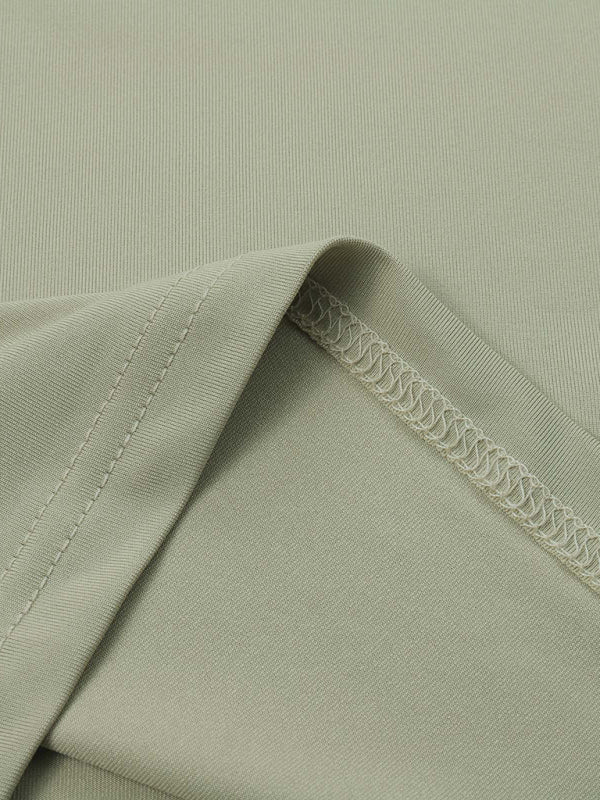 Close-up of light green solid color bottoming fabric with detailed stitching for Women’s T-shirt