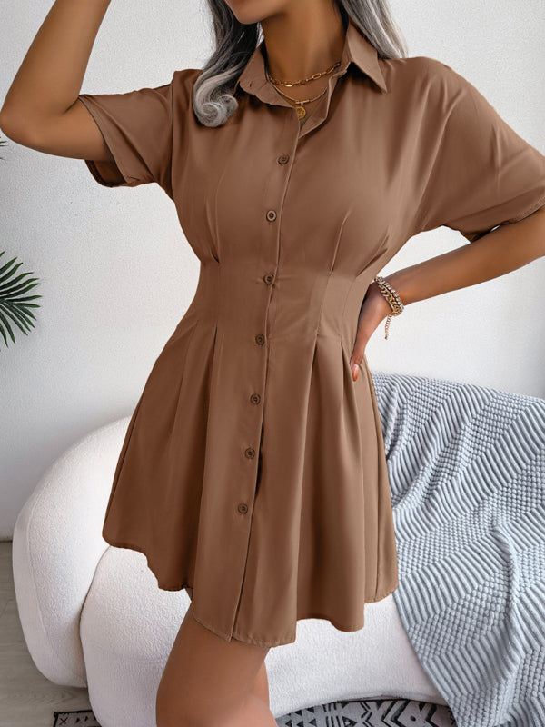 Brown button-down shirt dress with short sleeves, casual waist, and fold detail