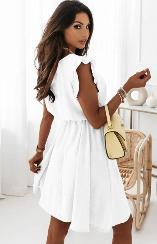White summer dress with ruffle sleeves and waist strap, made of polyester fabric