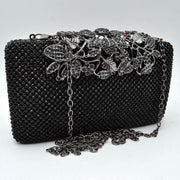 Studded Evening Clutch with Ornate Leaf Clasp Detail