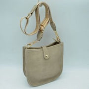 Minimalist Curved Crossbody Bag with Patterned Guitar Strap