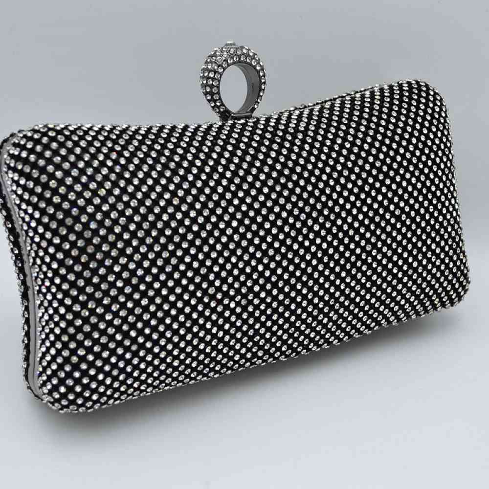 Shimmering Studded Clutch Bag with Textured O-Ring Clasp