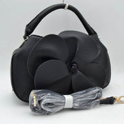Sculptural Floral Accent Satchel – Convertible Textured Crossbody Bag