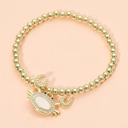 Women's Stainless Steel Mother of Pearl CZ Stone Paved Crab Charm Beaded Stretch Bracelet
