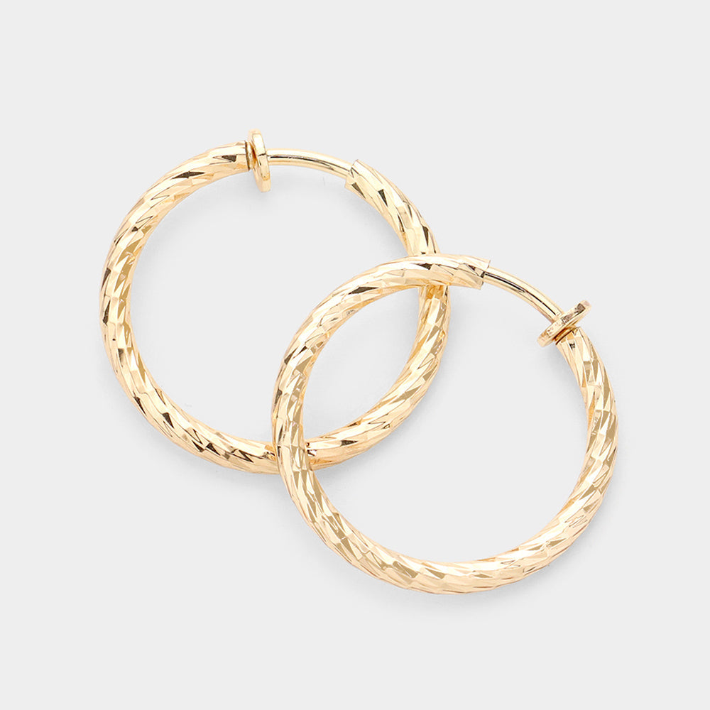 1.25" Textured metal hoop clip on earrings