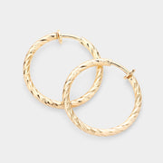 1.25" Textured metal hoop clip on earrings