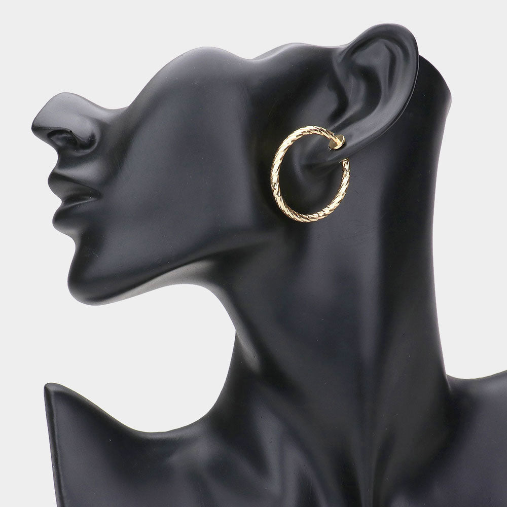 1.25" Textured metal hoop clip on earrings