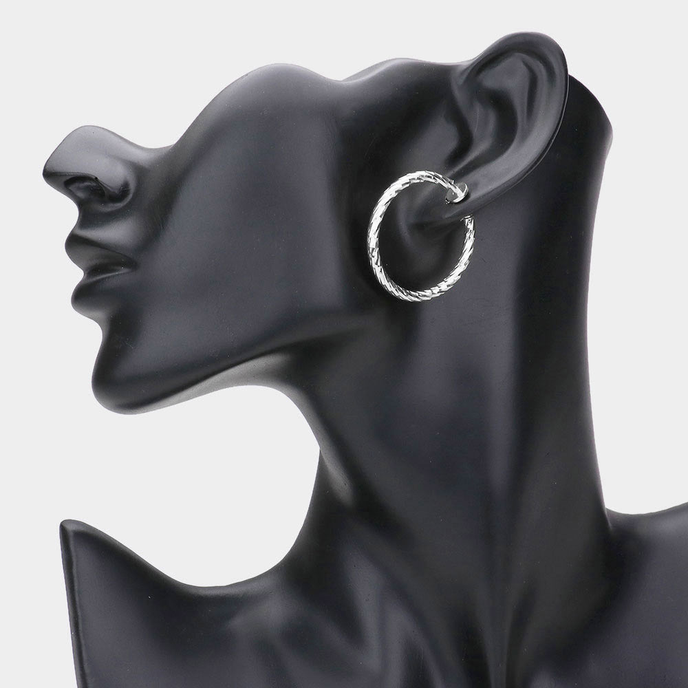 1.25" Textured metal hoop clip on earrings