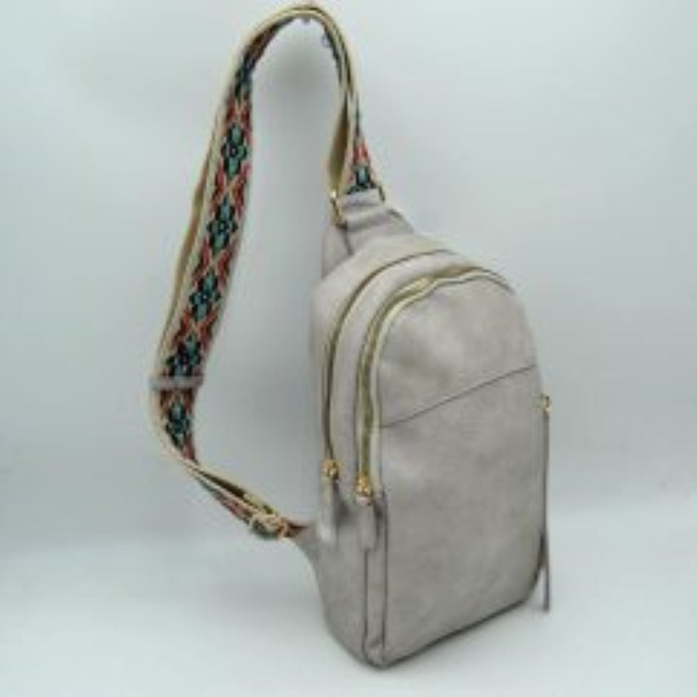 Multi-Zip Sling Backpack with Patterned Shoulder Strap