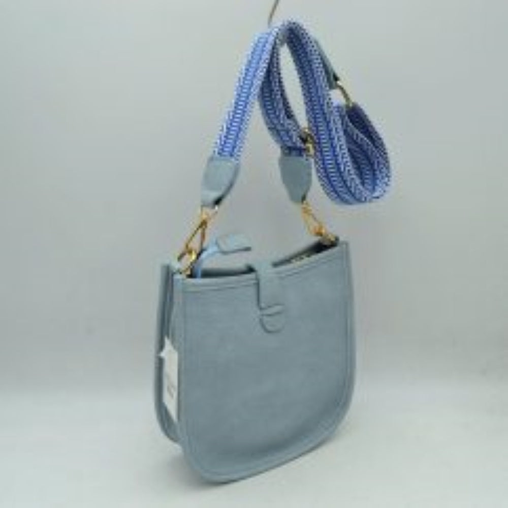 Minimalist Curved Crossbody Bag with Patterned Guitar Strap