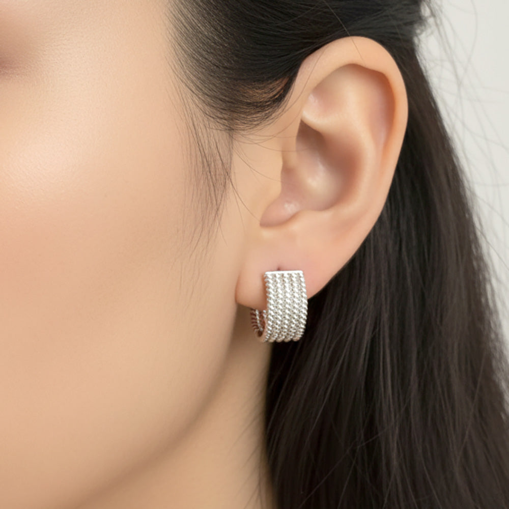White Gold Dipped Textured Huggie Hoop Earrings